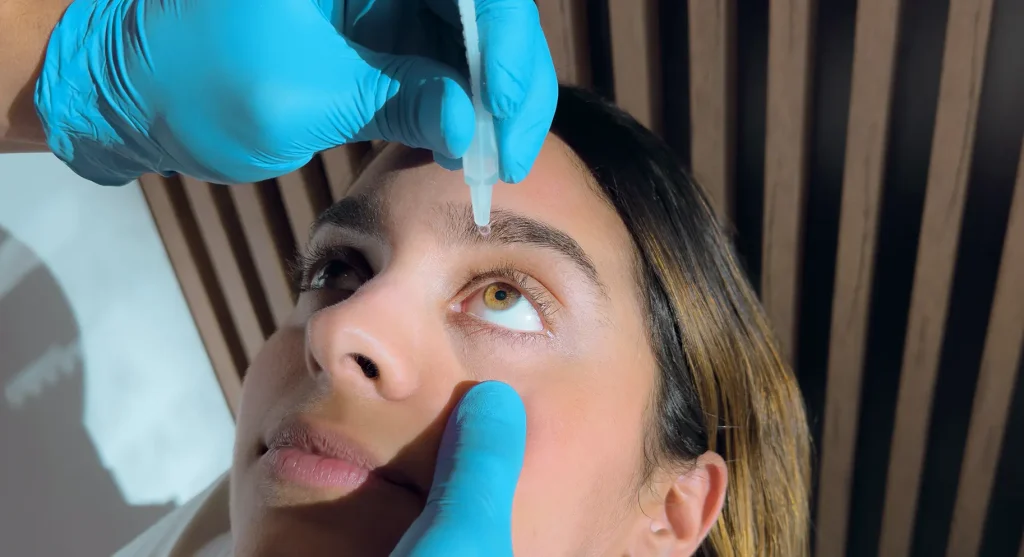 Close-up of an eye showing subtle upper eyelid lift achieved with Upneeq oxymetazoline eye drops